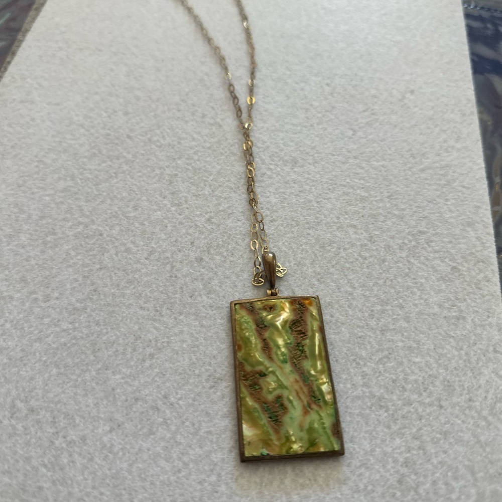 Double sided pendant one side abalone other side mother of pearl